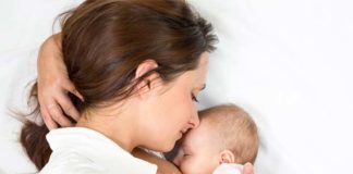 two month breast feeding halves the risk of cot death according to new research