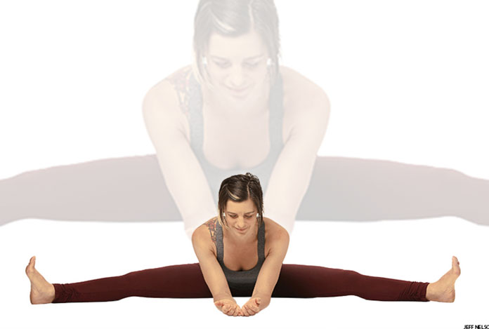 Seated wide angle forward bend for Does Yoga Really Help in Sexual Wellness